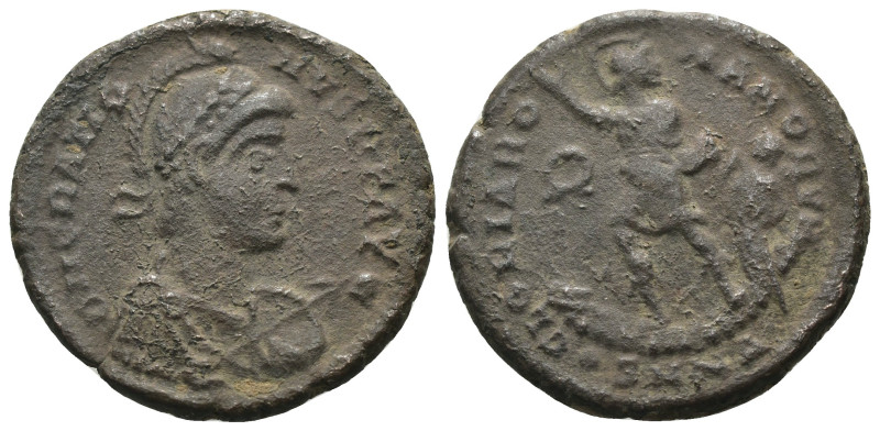 Gratian. (392-395 AD). Follis. Nicomedia. Obv: D N GRATIANVS P F AVG. helmeted a...