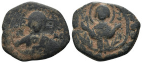 Byzantine Alexius I Comnenus (1081-1118). Æ Tetarteron Crowned facing bust, holding cross-sceptre and globus cruciger. R/ Decorated voided cross with ...