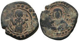 Byzantine Alexius I Comnenus (1081-1118). Æ Tetarteron Crowned facing bust, holding cross-sceptre and globus cruciger. R/ Decorated voided cross with ...