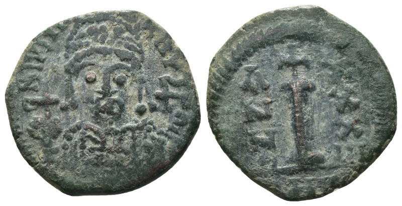 Justinian I. (527-565 AD) Æ 10 Nummi. Theoupolis. Obv: crowned bust facing. Rev:...