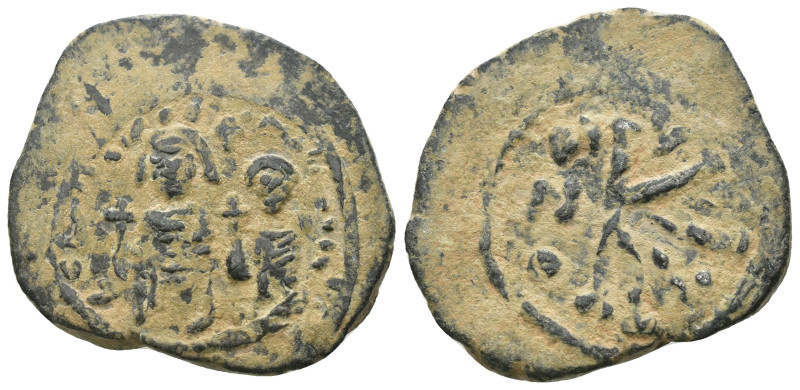 Phocas and Leonita. (602-610 AD) Æ 1/2 Follis. Obv: Phocas and Leonita standing ...