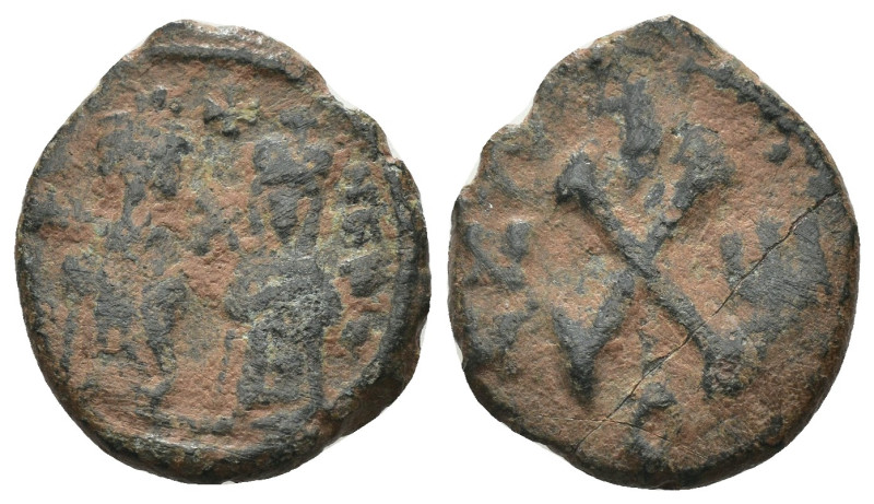 Phocas and Leonita. (602-610 AD) Æ 10 nummi. Obv: Phocas and Leonita standing fa...