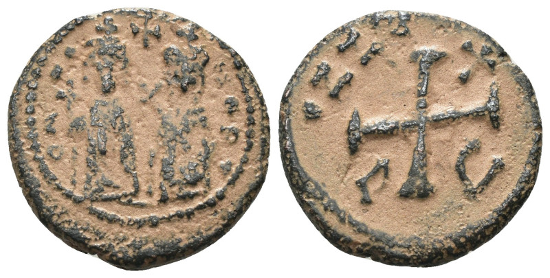 Phocas and Leonita. (602-610 AD) Æ 10 nummi. Obv: Phocas and Leonita standing fa...