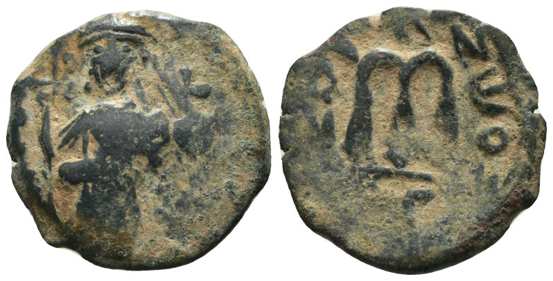 Phocas and Leonita. (602-610 AD) Æ Follis. Obv: Phocas and Leonita standing faci...