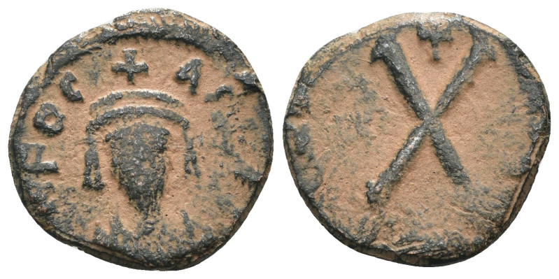 Phocas. (602-610 AD). Decanummium. Carthage mint. Obv: crowned bust facing. Rev:...