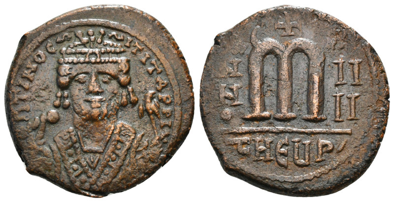 MAURICE TIBERIUS (582-602). Follis. Theoupolis (Antioch).
Obv: Crowned bust faci...