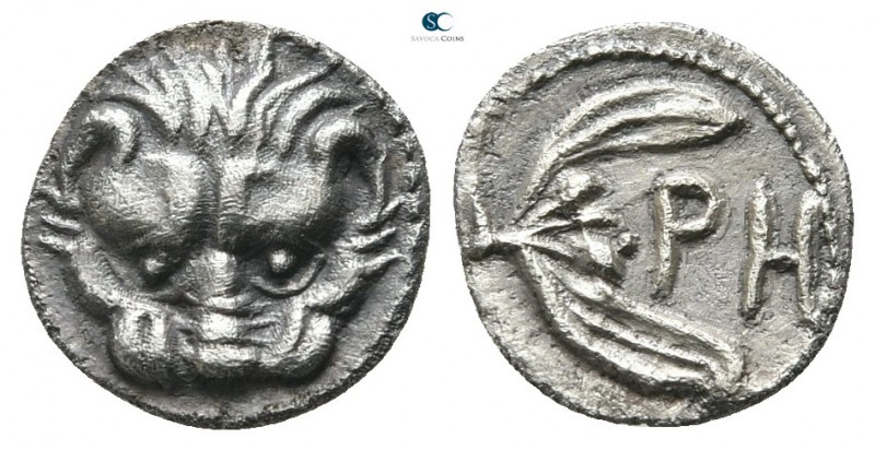 Bruttium. Rhegion circa 415-387 BC. 
Litra AR

10mm., ,72g.

Lion's mask fa...