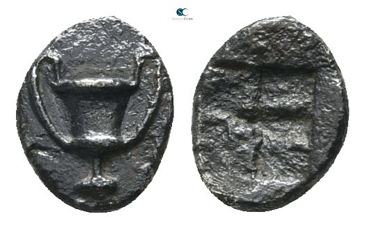 Cyclades. Naxos 520-470 BC. 
Tetartemorion AR

6mm., 0,17g.

Kantharos / In...