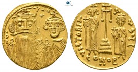 Constans II, with Constantine IV, Heraclius, and Tiberius AD 641-668. Struck AD 662-667. Constantinople. 10th officina. Solidus AV