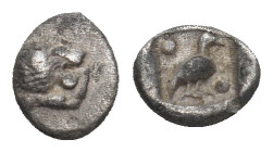 CARIA. Mylasa. Tetartemorion (420-390 BC).
Obv: Forepart of roaring lion left, head turned back.
Rev: Bird standing right, pellets flanking; all wihti...