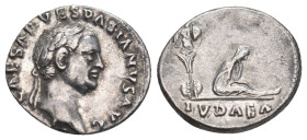 VESPASIAN (69-79). Denarius. Rome. "Judaea Capta" issue.
Obv: IMP CAESAR VESPASIANVS AVG.
Laureate head right.
Rev: IVDAEA.
Judaea seated right, with ...