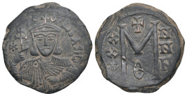 THEOPHILUS (829-842 AD). Ae. Follis. Constantinople.
Obv: ✷ ΘЄOFIL ЬASIL.
Crowned and draped bust facing, holding patriarchal cross and akakia.
Rev: L...