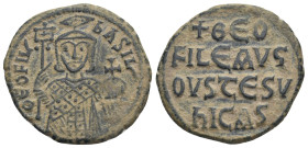 THEOPHILUS, 829-842 AD. AE, Follis. Constantinople.
Obv: ΘЄO[FIL] ЬASI[LЄ].
Facing bust, holding labarum and globus cruciger, and wearing crown surmou...