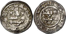 Califato. AH 389. Hisham II. Madinat Fas (Fez). Dirhem. (V. 614). Partida en tres trozos y pegada. Rara. 2,78 g. (MBC).