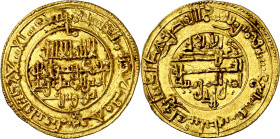 Almorávides. AH 517. Ali ibn Yusuf. Gharnata (Granada). Dinar. (V. 1615) (Hazard 248). Con la preposición delante de la ceca. Bella. 4 g. EBC.
