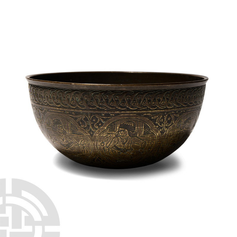 Qajar Period Decorated Bowl
19th century A.D.. Spun bronze bowl with everted ri...