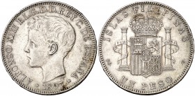 1897. Alfonso XIII. Manila. SGV. 1 peso. (Cal. 81). 25,01 g. Golpecito en canto. MBC.