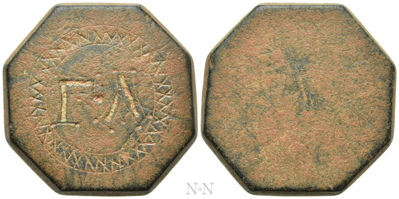 COMMERCIAL WEIGHT (Circa 4th-6th centuries). Octagonal Ae One Ounce Weight. 

...