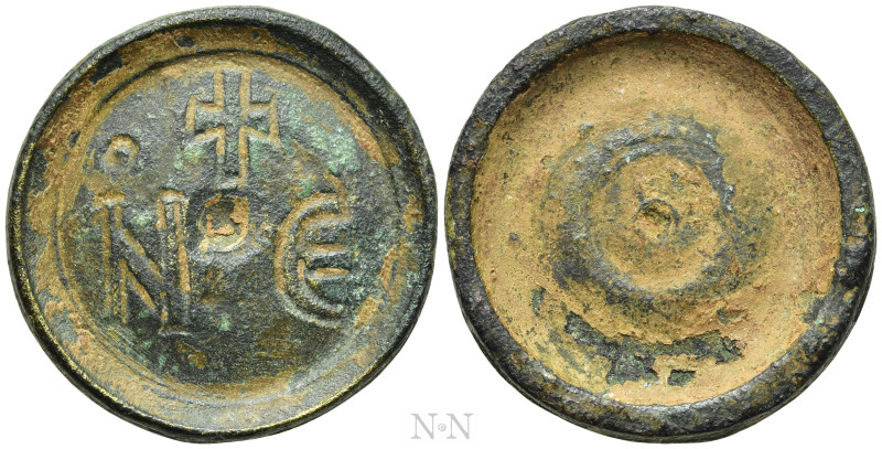 COIN WEIGHT (Circa 5th-7th centuries). Round Ae Five Nomismata Weight. 

Obv: ...