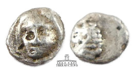 CARIA, Hekatomnos (Satrap). AR Tetartemorion, circa 392/1-377/6 BC., Forepart of a roaring lion left / Laureate head of Apollo facing slightly left. 7...