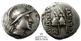 BAKTRIA, Greco-Baktrian Kingdom. Eukratides I Circa 170-145 BC., AR Obol, Diademed and draped bust right / Caps of the Dioscuri with palms; monogram b...