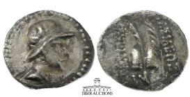 BAKTRIA, Greco-Baktrian Kingdom. Eukratides I Circa 170-145 BC., AR Obol, Diademed and draped bust right / Caps of the Dioscuri with palms; monogram b...