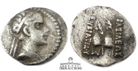 BAKTRIA, Greco-Baktrian Kingdom. Eukratides I Circa 170-145 BC., AR Obol, Diademed and draped bust right / Caps of the Dioscuri with palms; monogram b...