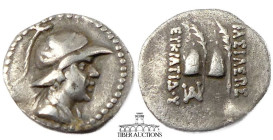 BAKTRIA, Greco-Baktrian Kingdom. Eukratides I Circa 170-145 BC., AR Obol, Diademed and draped bust right / Caps of the Dioscuri with palms; monogram b...