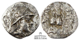 BAKTRIA, Greco-Baktrian Kingdom. Eukratides I Circa 170-145 BC., AR Obol, Diademed and draped bust right / Caps of the Dioscuri with palms; monogram b...