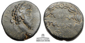 COMMAGENE, Zeugma. Lucius Verus. AD 161-169. Æ 24. Laureate and cuirassed bust right / Legend in two lines; Γ below; all within laurel wreath. 21 mm, ...