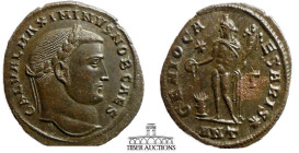 Maximinus I, as Caesar AD 305-309. Æ Follis. Antioch mint. Genius standing left. Rare. Light deposit on reverse. 25 mm, 5.56 g