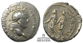 Vespasian AD 69-79. AR Denarius. Ephesus mint. Struck AD 71. Laureate head right / Titus and Domitian standing facing, each holding patera; EPHE in ex...