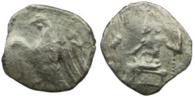 CILICIA. Uncertain.AR Obol (4th century BC).
Obv: Baaltars seated left, holding grain ear, grapes and sceptre.
Rev: Eagle standing left on Plow.
Göktü...