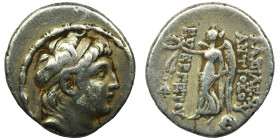 SELEUKID EMPIRE. Antiochos VII Euergetes (Sidetes). 138-129 BC. AR Drachm . Uncertain mint 103, prob. in Syria. Diademed head right / Nike advancing l...