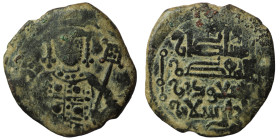 ISLAMIC. Seljuks. Rum. Rukn al-Din Mas'ud I (AH 510-551 / 1116-1156). Fals.
Obv: Half-length facing bust, and holding labarum and globus cruciger.
Rev...