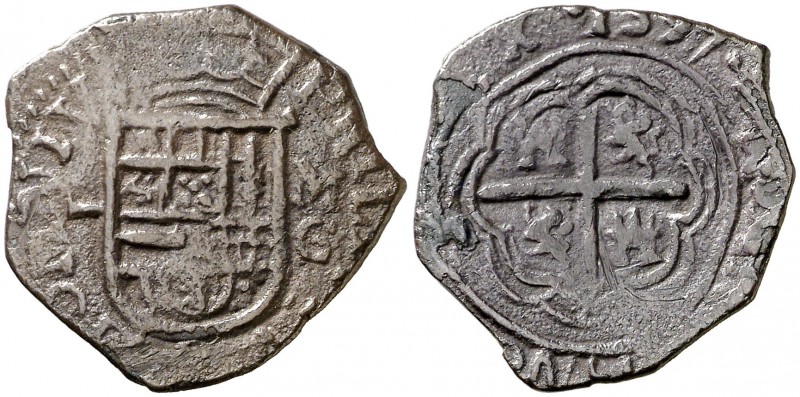 1597. Felipe II. Granada. M. 1 real. (Cal. 627). 3,54 g. Tipo "OMNIVM". Fecha en...