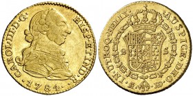 1784/70. Carlos III. Madrid. JD/PJ. 2 escudos. (Cal. 455 var). 6,74 g. Rarísima y más con estas rectificaciones no reseñadas en Calicó. Sólo conocemos...