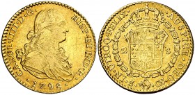 1798. Carlos IV. Sevilla. CN. 2 escudos. (Cal. 450). 6,70 g. Grafiti en forma de aspa en anverso. MBC-/MBC.
