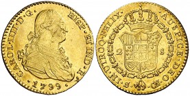 1799. Carlos IV. Sevilla. CN. 2 escudos. (Cal. 451). 6,74 g. Hojitas en anverso. Parte de brillo original. MBC+/EBC-.