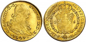 1807. Carlos IV. Sevilla. CN. 2 escudos. (Cal. 459). 6,73 g. Leve falta de presión. Bella. Brillo original. EBC.