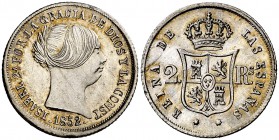 1852. Isabel II. Sevilla. 2 reales. (Cal. 380). 2,69 g. Preciosa pátina. Brillo original. Rara así. S/C-.