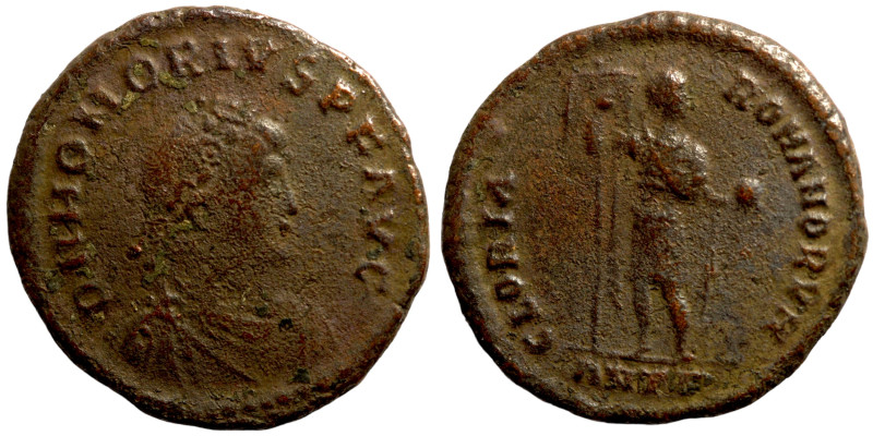 Honorius. (393-395 AD). Follis. Obv: DN HONORIVS PF AVG. pearl-diademed bust of ...