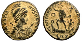 Gratian. (392-395 AD). Follis. Obv: D N GRATIANVS P F AVG. helmeted and armed bust of Gratian right. Rev: GLORIA ROMANORVM. Gratian standing left on g...