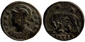 Constantine I the Great 307/10-337 AD. AE Follis  Helmeted and mantled bust of Roma to left. Rev. SMTSE She-wolf standing left, head turned right, suc...