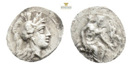 CILICIA, Uncertain mint (Circa 4th century BC)AR Obol (11 mm, 0.68 g.)Obv: Helmeted head of Athena right.Rev: Baaltars seated right on throne, eagle i...