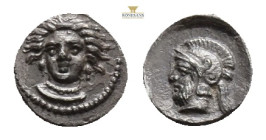 Cilicia, Tarsos AR Obol. Time of the satraps Pharnabazos and Datames. Circa 380-360 BC. Female head (Arethusa?) facing slightly to left / Helmeted and...