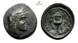 Bithynia, Kios. Ae, 1.6 g. 13,1 mm. Circa 300 BC.Obv: Head of Mithras right, wearing a laureate tiaraRev: KI, kantharos with two grape vines; all with...
