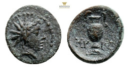 AEOLIS. Myrina. Ae (2nd-1st centuries BC). 1,9 g. 13,7 mm. Obv: Radiate and draped bust of Helios right. Rev: MY - PI. Amphora. SNG Copenhagen 226; SN...