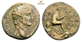 Roman ProvincialClaudius Æ26 of Mallus, Cilicia. AD 41-54. KΛAVΔIOC KAICAP, laureate head right / Tyche seated right, holding branch; two river-gods s...