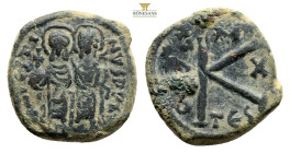 Justin II. 565-578. Æ half follis Thessalonica, 569/570. D N IVSTINVS PP AV, Justin II and Sophia seated on throne facing, both nimbate; he holds a gl...